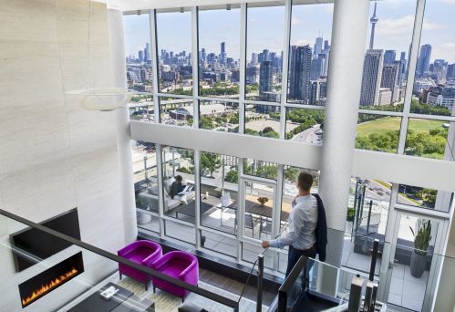Our Bi Level Penthouse Suite features floor to ceilings windows showcasing outrageous views.